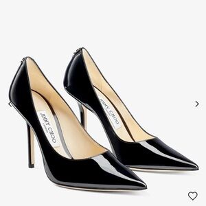 JIMMY CHOO Black Patent Leather Pointed-Toe Pumps with JC Emblem